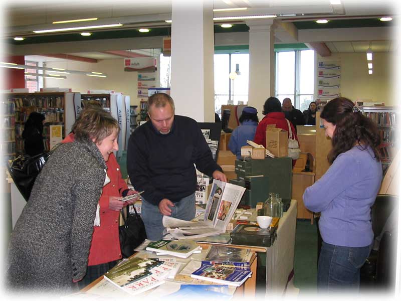 Martin Collins showing visitors information about the hospitals
